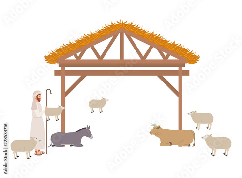 Shepherd with sheeps in stable