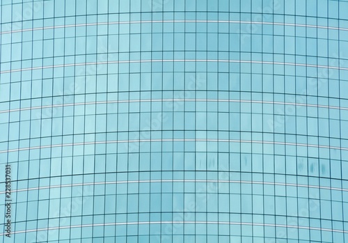pattern of modern glass windows building skyscrapers of business center in the city