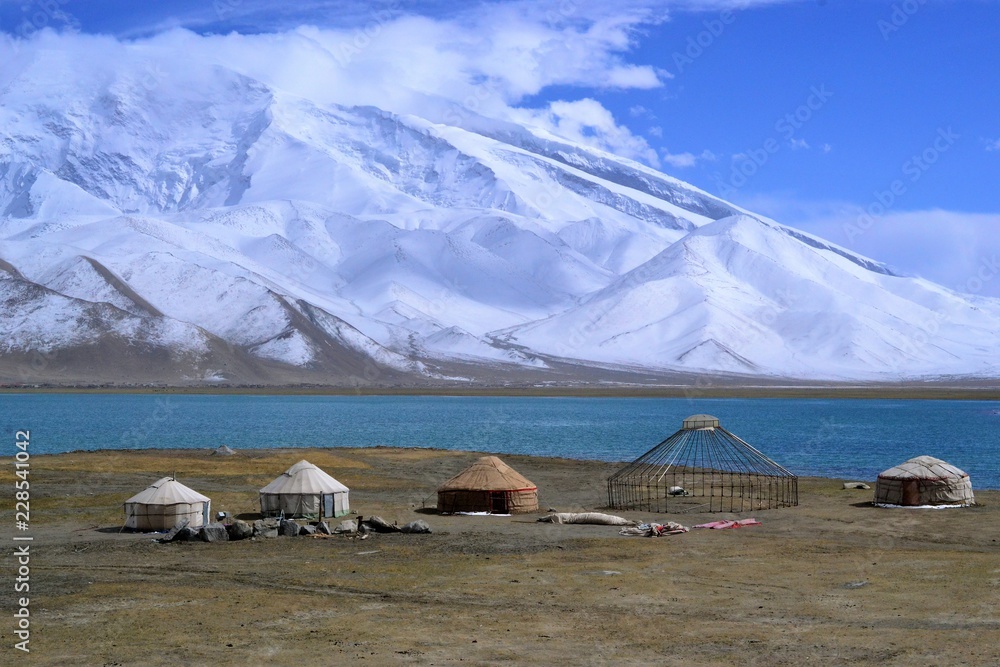 Kirgiz yurt on the shore of the Karakul lake in Karakorum highway, Xinjiang, China