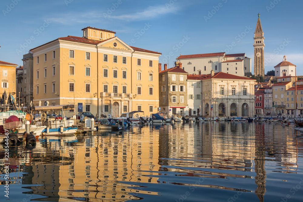 Houses in adriatic town Piran and their reflections, Slovenia