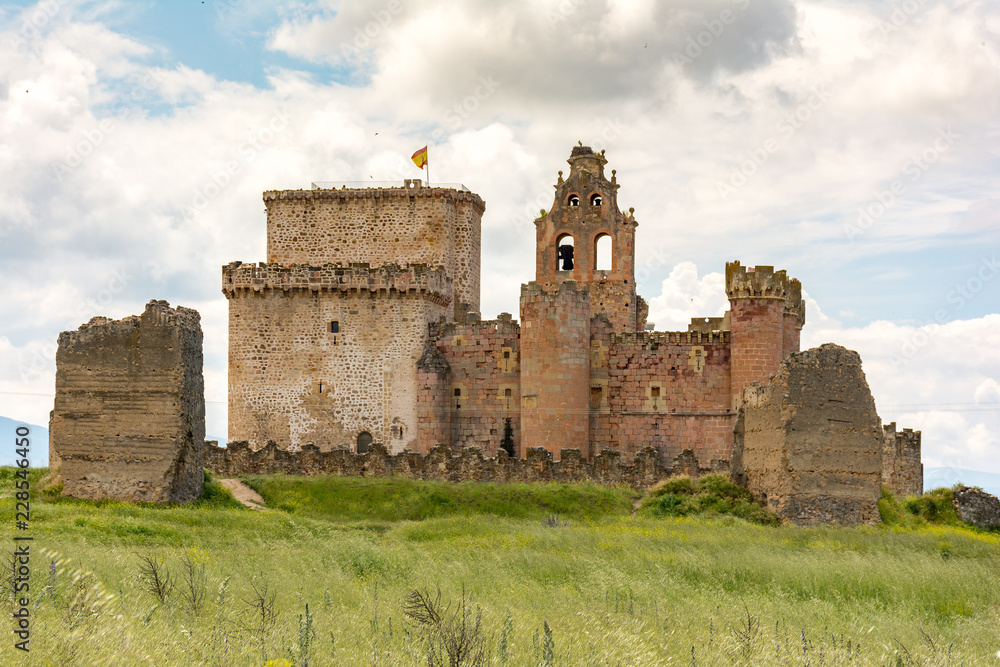 The picture of the castle of Turégano, perched on the top of a hill that dominates the town and its monumental square, is one of the most suggestive and popular in Castile. (Segovia, Spain) The picture of the castle of Turégano, perched on the top of a hill that dominates the town and its monumental square, is one of the most suggestive and popular in Castile. (Segovia, Spain)