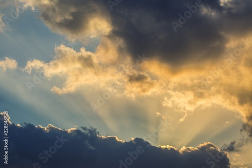 Beautiful, heavy clouded blue sunset sky background. © layue