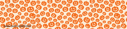 Halloween - concept of seamless pattern with pumpkins. Vector.