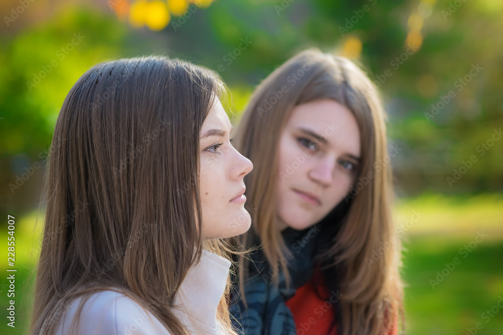 Two girlfriends having a quarrel Two girlfriends having a quarrel