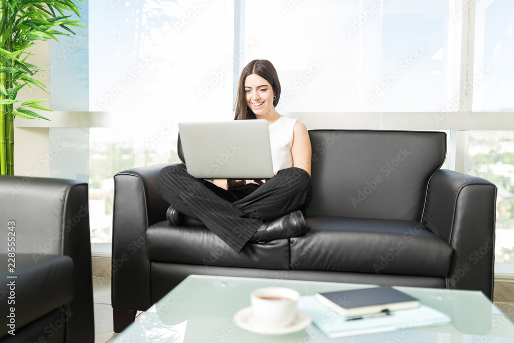 Smiling Director Implementing Strategic Plans In Office Lobby Smiling Director Implementing Strategic Plans In Office Lobby