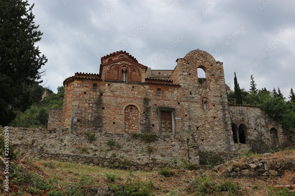 Ruins of old monastery in medieval abandoned town Mystras, Peloponnese, Greece