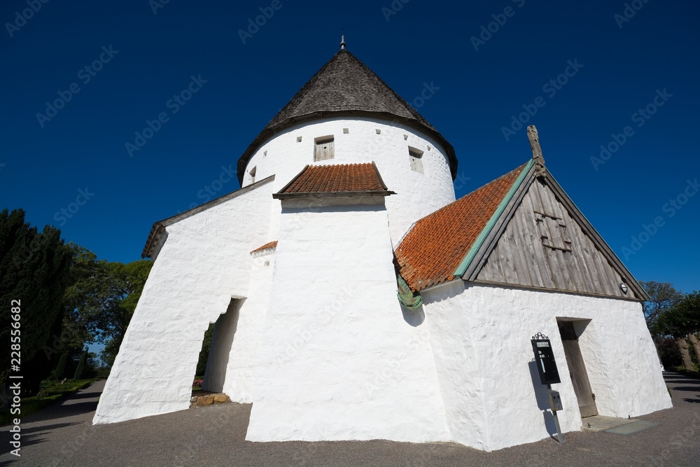 Defensive round church in Olsker, Bornholm, Denmark. It is one of four round churches on the Bornholm island. Built about 1150, 26 meter high, considered the most elegant round church