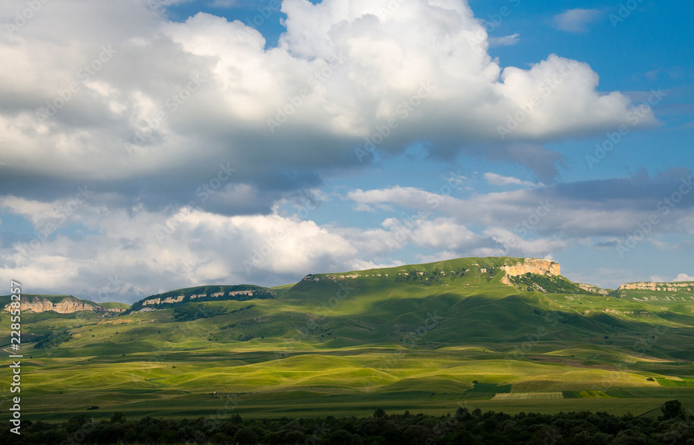 Beautiful mountain landscape and meadows with nice blue sky and cloud on summer sunny day