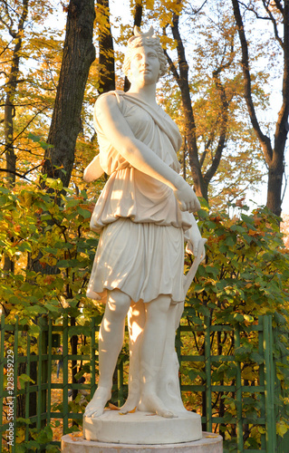 Canvas Print Goddess Diana statue at evening.