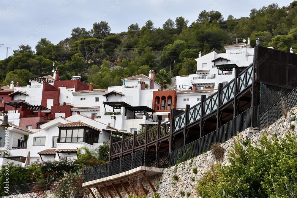 urbanizacion tipica andaluza con mirador de forja de hierro construida sobre muro de piedra urbanizacion tipica andaluza con mirador de forja de hierro construida sobre muro de piedra