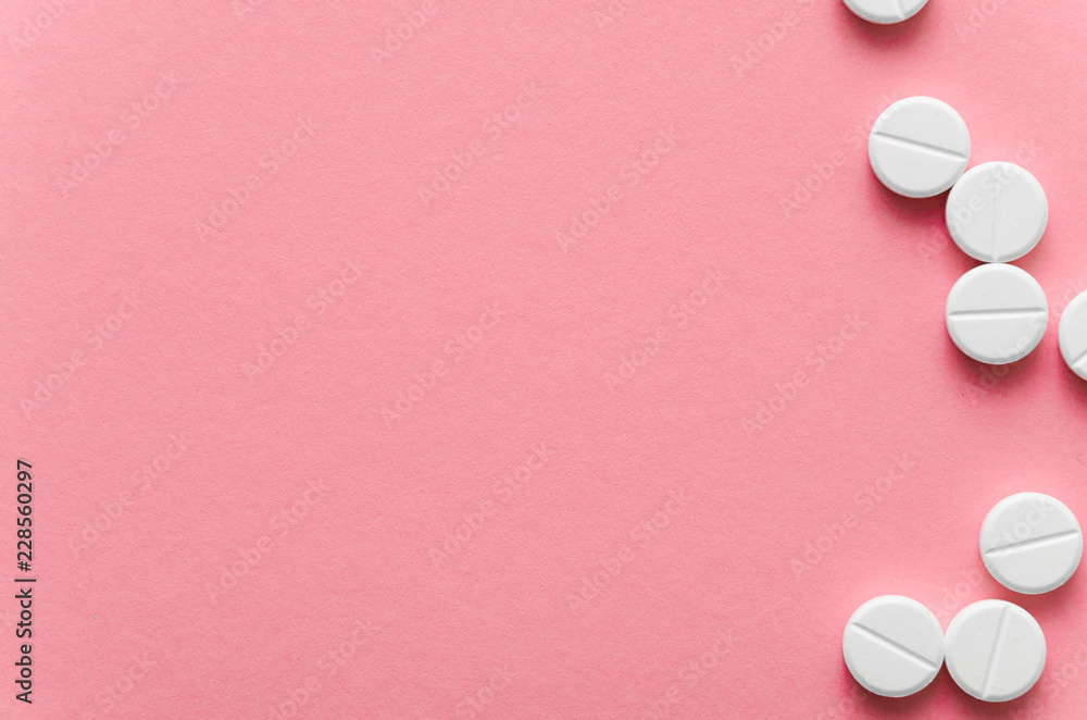 Close-up of pills on pink background Close-up of pills on pink background