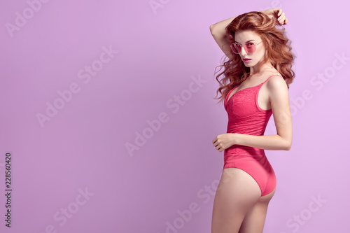 Fashion. Playful Redhead Girl, skin care concept
