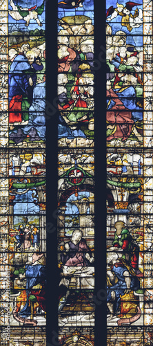 Interiors of Lichfield Cathedral - Stained Glass in Lady Chapel center - The Ascension  The Supper at Emmaus and Two female donors and the Virgin and Child Close up