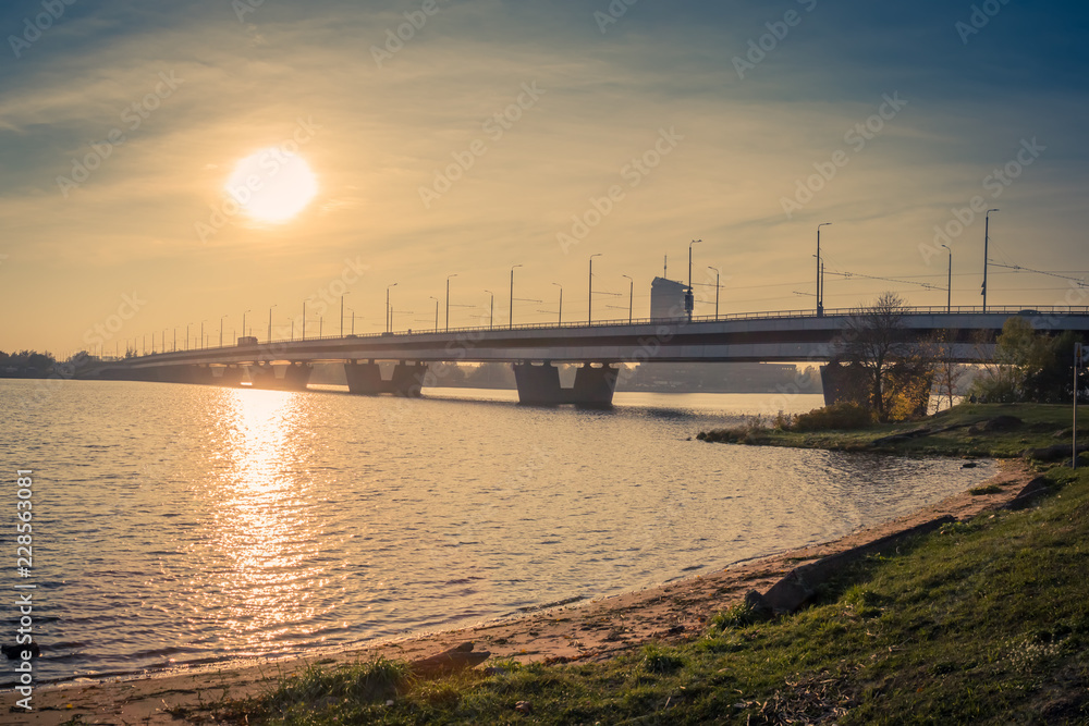 bridge in Riga over the Daugava River in the fall in October on a sunny day