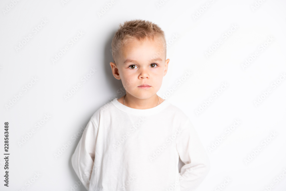 Close up portrait of cute little boy on background Close up portrait of cute little boy on background