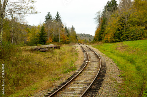Railroad tracks on the mountain in fall horizontal shot