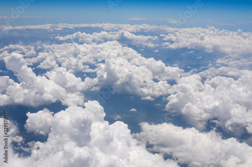 view of the clouds below from the plane © KVN1777