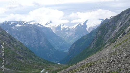 Mountains landscape peaks covered with snow. View from norwegian national tourist scenic route Gamle Strynefjellsvegen, from Grotli to Videseter photo