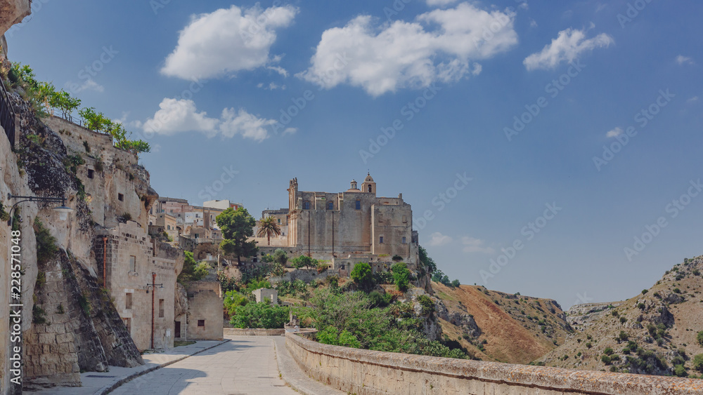 Fototapeta premium Road leading to Convent of Saint Agostino in the sassi of Matera, Italy
