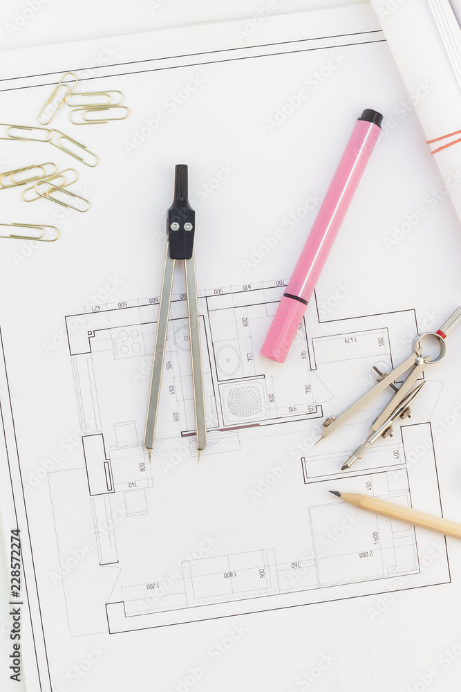 Interior designer table workplace with house plan Interior designer table workplace with house plan