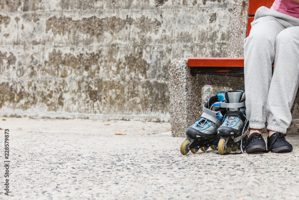 Woman with roller skates outdoor. Woman with roller skates outdoor.