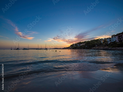 Beautiful sunset at Illetes Beach in Mallorca Spain