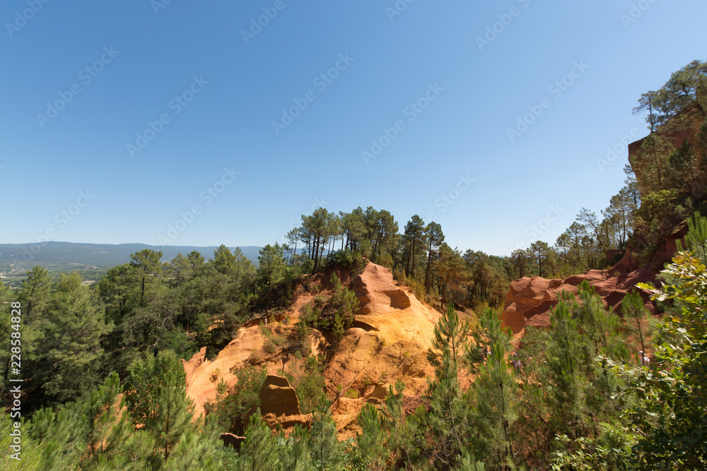 Orange ocher soil in Roussillon village, Luberon national park, Provence, France