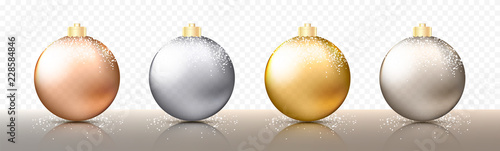 Four realistic Christmas transparent Baubles, spheres or balls in different shades of metallic gold and silver color with golden caps and snow or snowflakes. Vector illustration eps10