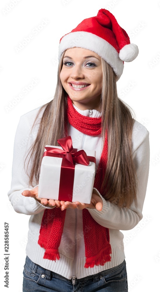 Smiling Woman with Santa Hat Holding a Present - Isolated Smiling Woman with Santa Hat Holding a Present - Isolated