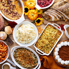 Thanksgiving table with turkey and sides