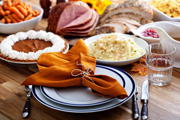 Thanksgiving table with turkey and sides