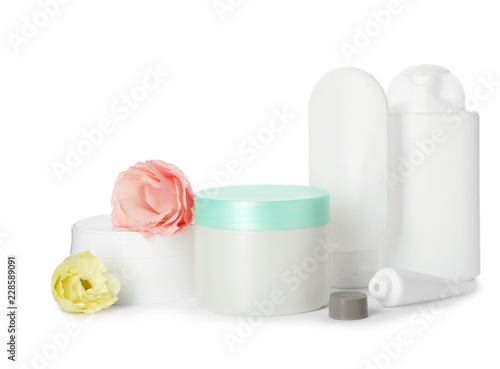 Jars with cream and bottles on white background. Hand care cosmetics