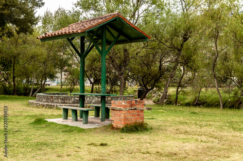 Gazeebo in a park near a river in Gualaceo photo