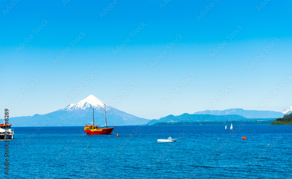 Obraz premium Osorno volcano and Llanquihue lake, Parque, Puerto Varas, Chile. Copy space for text