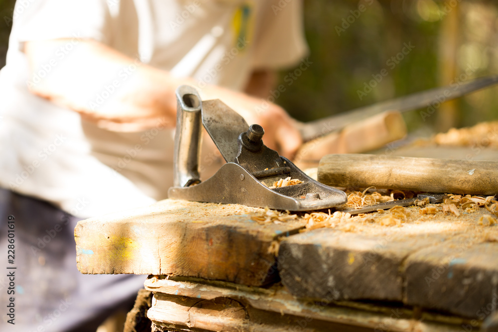 grandfather working on his Woodworking shop