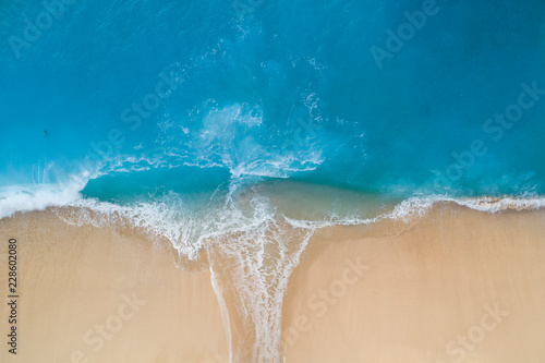 Aerial view of turquoise sea and sandy shore photo