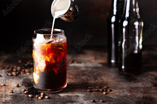 Canvas Print Cold brew iced coffee in glass bottles