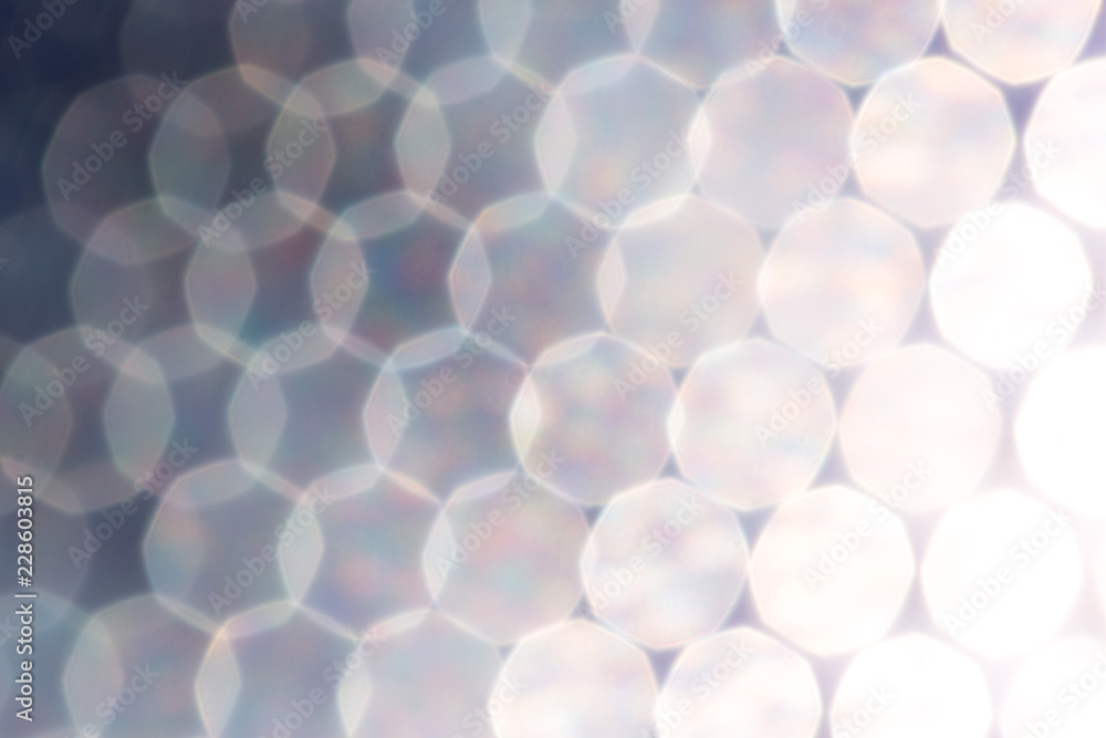 silver and white bokeh lights defocused. abstract background silver and white bokeh lights defocused. abstract background
