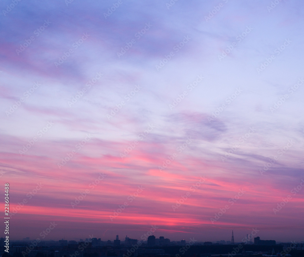 sunrise sky over the city at cold summer morning. background, nature. sunrise sky over the city at cold summer morning. background, nature.