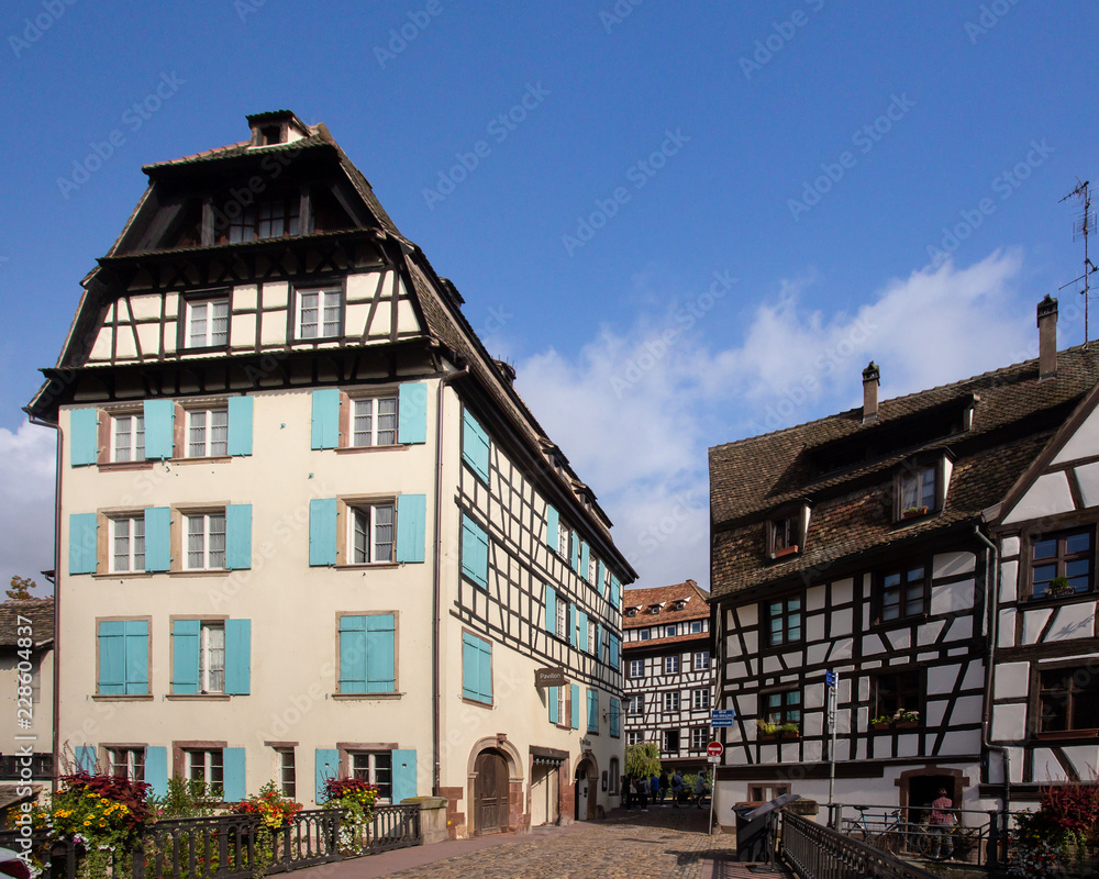 View of beautiful half-timbered houses along the canal seen from Strasbourg France