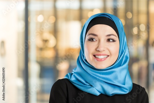 Close-up Beautiful Young Muslim Woman on  background photo