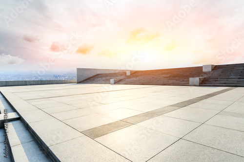 Panoramic skyline and buildings with empty concrete square floor © ABCDstock