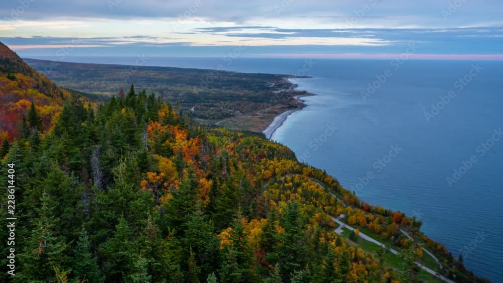 Evening time-lapse overlooking the renowned Forillon National Park during autumn with colorful trees Evening time-lapse overlooking the renowned Forillon National Park during autumn with colorful trees