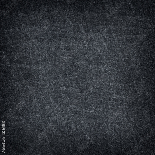 Dark grey black slate background or texture. © prapann