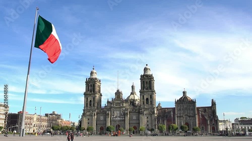 Cathedral of Mexico City the mexican flag flutters