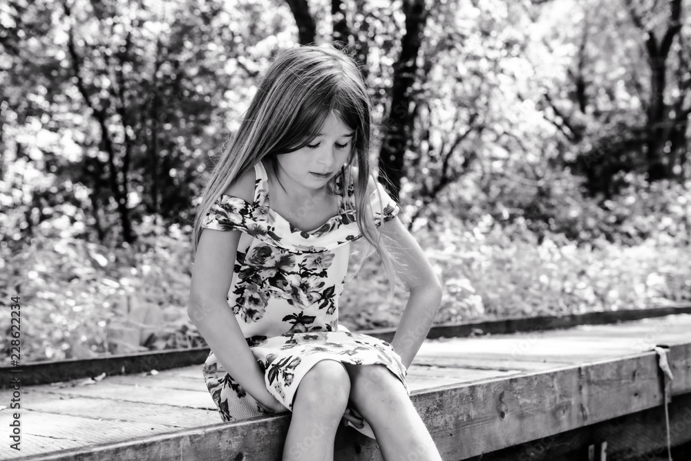Young sad girl child alone on country forest Young sad girl child alone on country forest