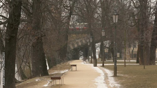 Wallpaper Mural A red Tram pass over the bridge in winter day and snowfall in slow motion Torontodigital.ca