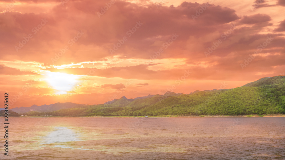 This serene lake on a summer season and sunset light in dam Srinagarindra at beautiful kanchanaburi province of thailand.