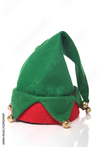 Christmas elf hat on a white surface