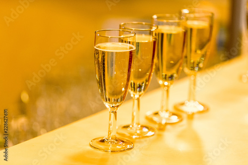 four glasses with sparkling wine